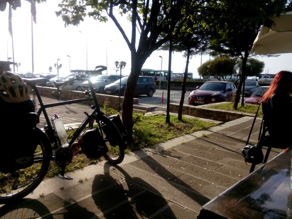 Just arrived in Izmir - the bright light behind my bike is the Mediterranean, my on-off companion for the last couple of months, but soon to be a memory.