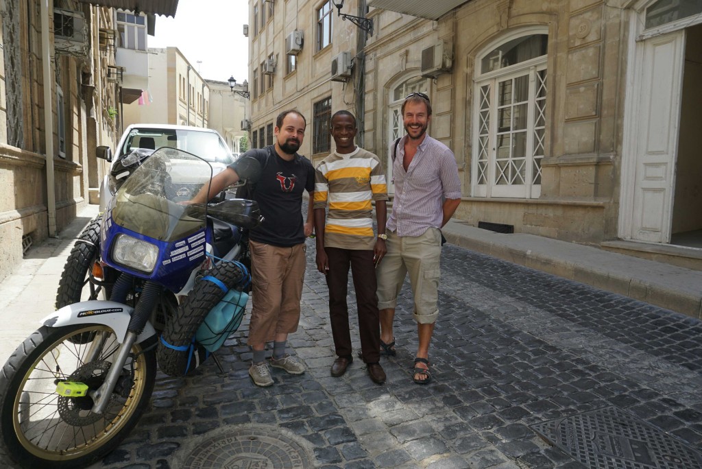 With Silk Road motorcyclist, Baptiste, and Babatunde at Baku Old City hostel