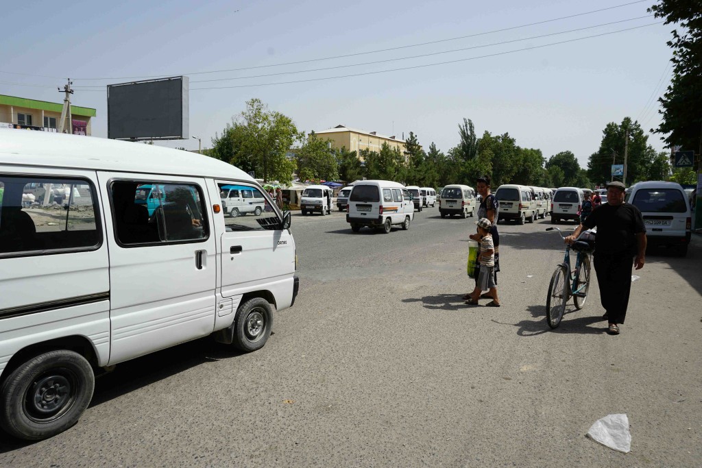 The ubiquitous Chevy and Daiwoo vans. Sharisabz, Uzbekistan