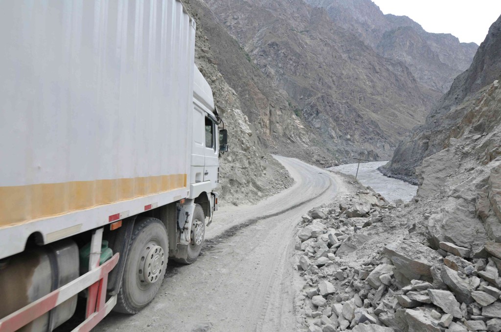 Chinese trucks plied this insanely twisty road day and night, although 99% of the time it was utterly deserted. Photo credit: T.Mourait
