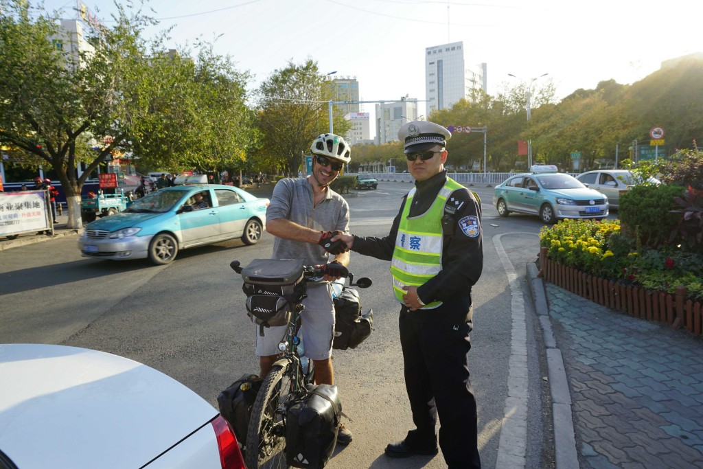 With the police who finally escorted me off the G33, in Changji