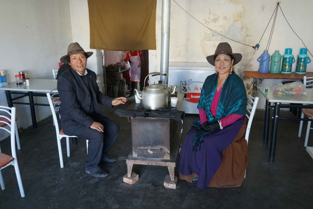 Friendly Tibetan couple in a cafe en route to Yushu