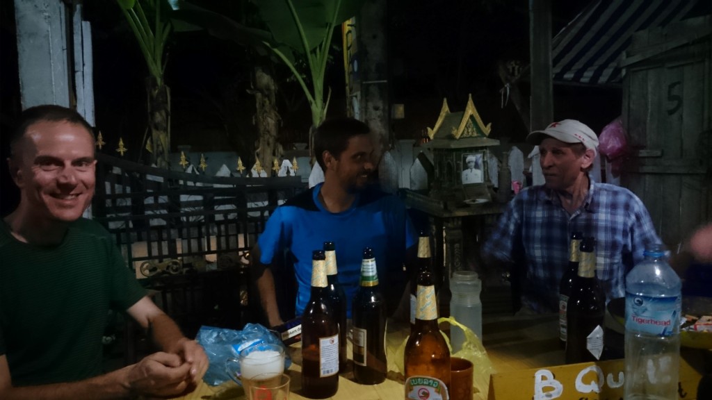 With cyclist Marc and friend John at Spic Laos hostel, Luang Prabang. Photo credit: D. Tan