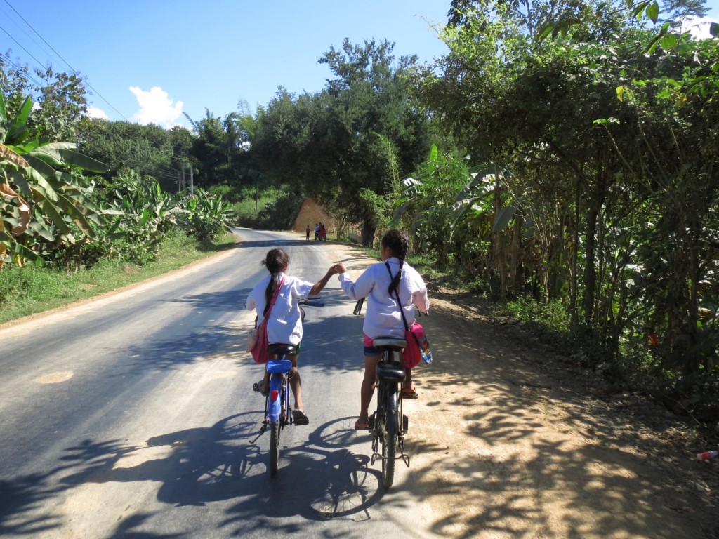 A common smile-raising sight on the roads of Northern Laos