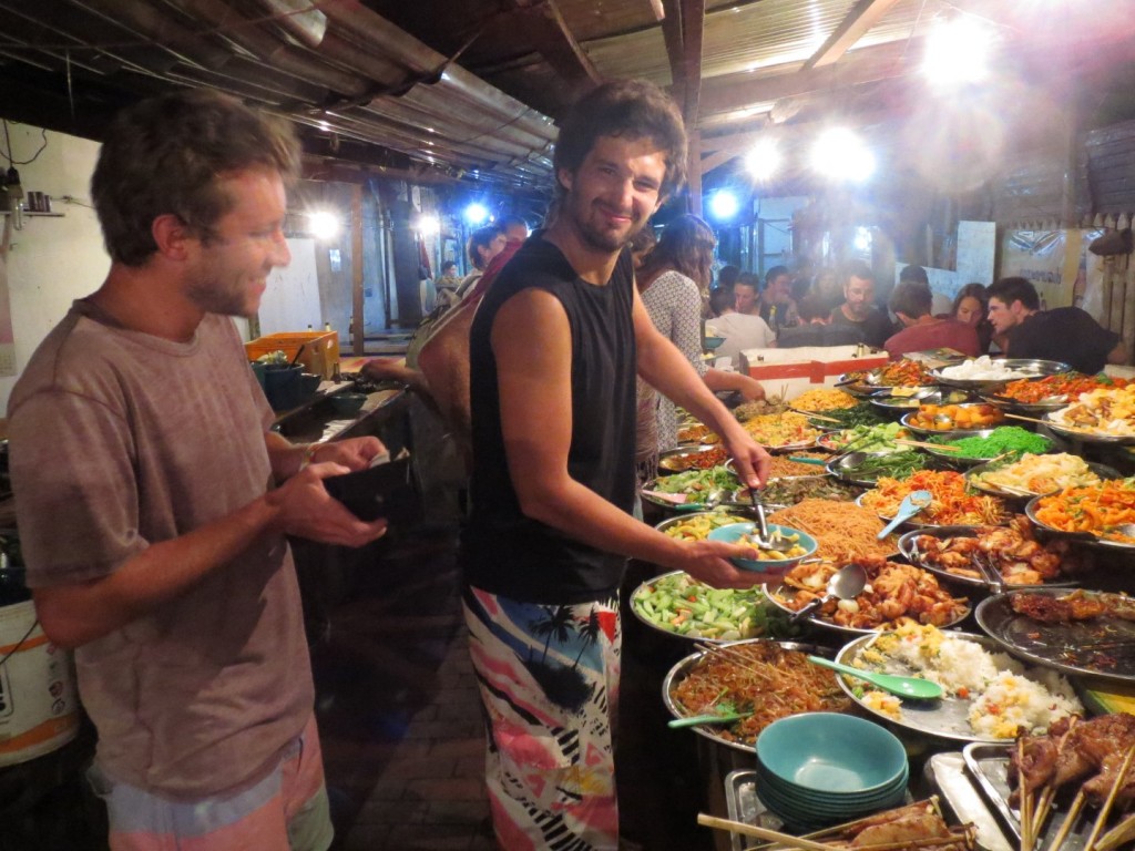 Francis & Chris loading up at the 'all you can fit on a plate' buffet in the nightmarket, Luang Prabang 