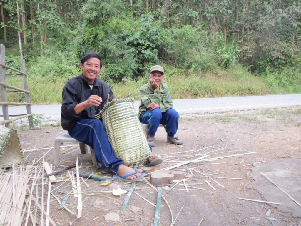 John Chang Sr, making baskets for his chickens (really).