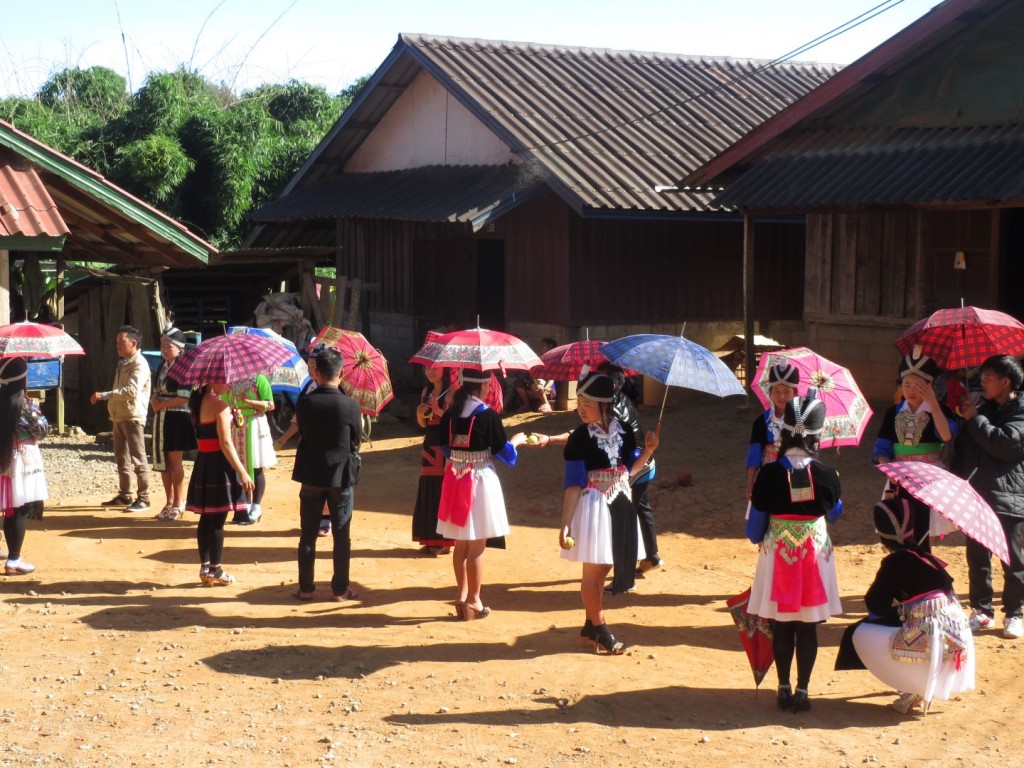 My journey north of Vang Vieng coincided with the Mon people's new year celebrations. Colourful dresses and ball games were on display everywhere. 