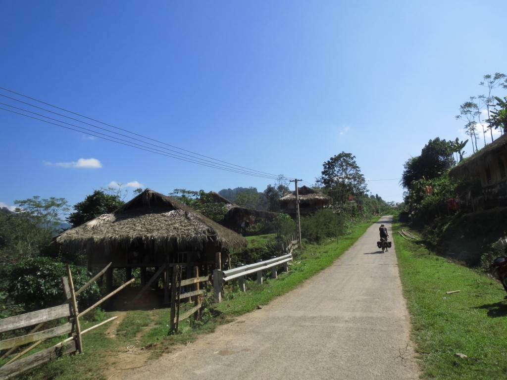 Wooden shacks thatched with leaves, Northern Vietnam.