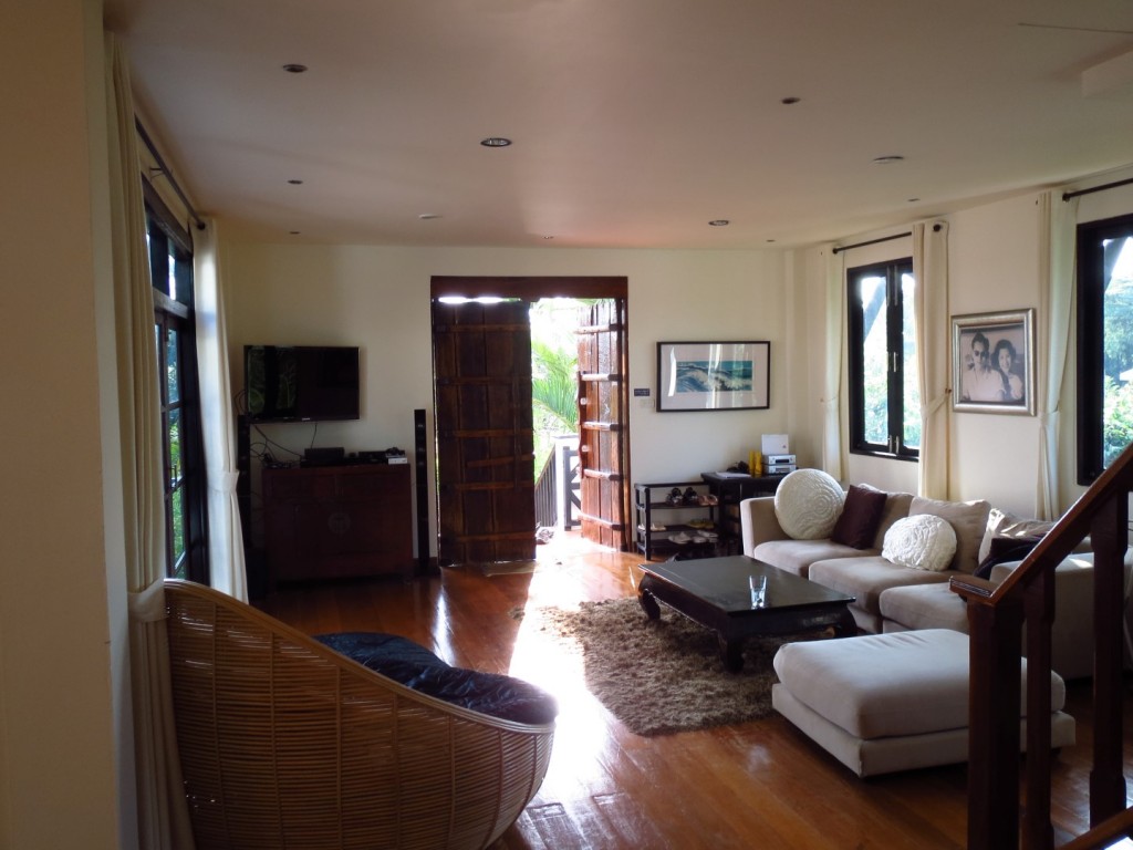 Interior of the villa, complete with obligatory photo of Thai king and queen on the wall.