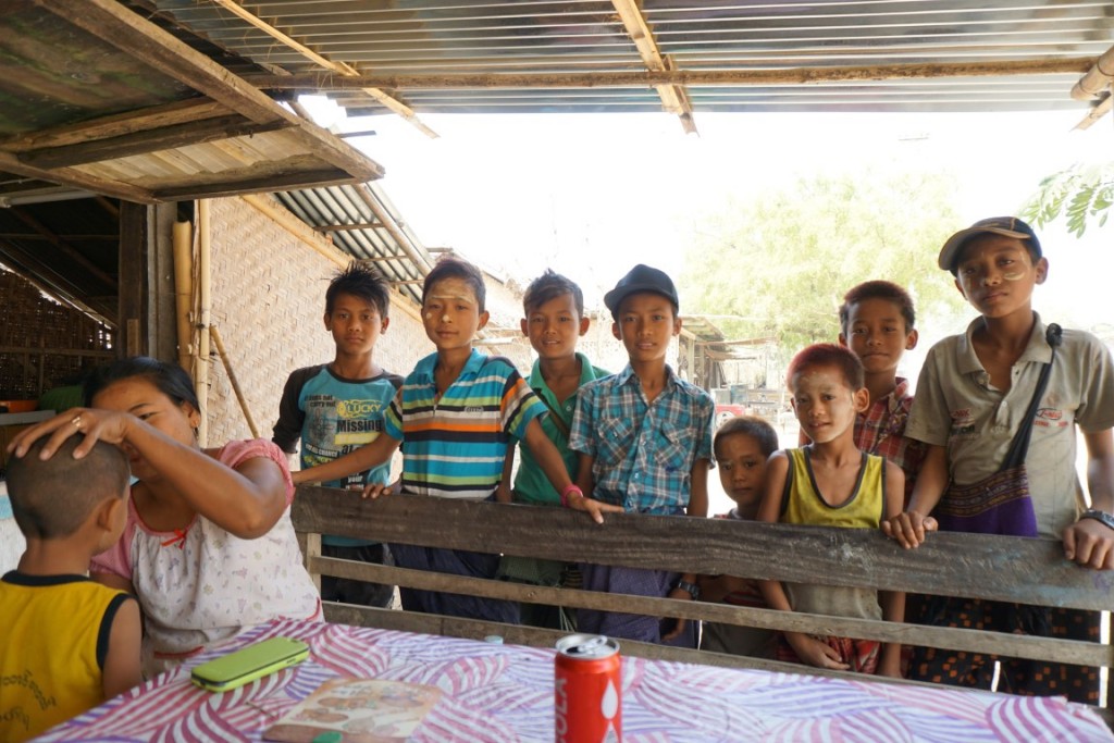 Mingalabar! Kids getting their faces painted with thanaka (made from wood bark, a kind of natural sunscreen).