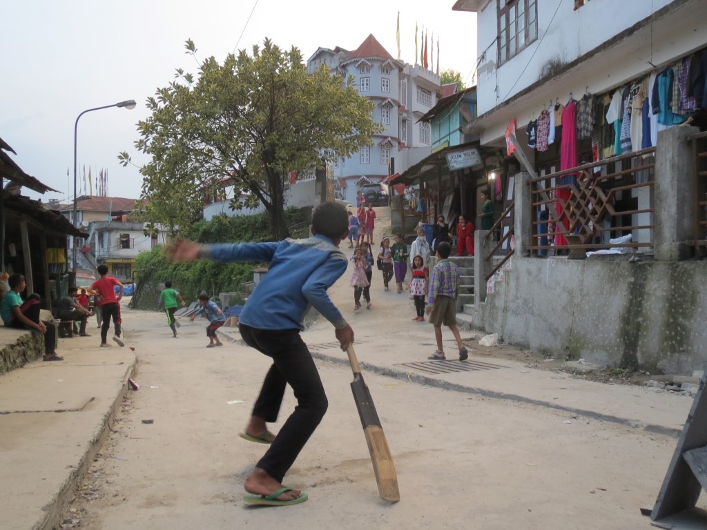 Street cricket is played by kids everywhere in India. This is in Mangan, Sikkim.